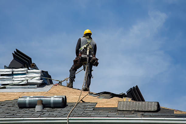 Professional Roof Replacement technician working in Livingston, CA